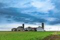 A simple Amish farm house with 2 silos in rural Pennsylvania, Lancaster County, PA, USA Royalty Free Stock Photo