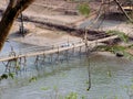 A makeshift bridge serves as a shortcut in Laos