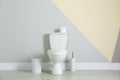 Simple bathroom interior with new toilet bowl Royalty Free Stock Photo