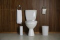 Simple bathroom interior with new toilet bowl Royalty Free Stock Photo