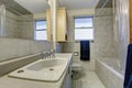 Simple bathroom with tile floor and window.