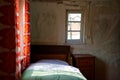 Simple bedroom of old peasant house Royalty Free Stock Photo