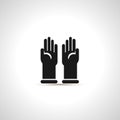 Simple black icon of pair latex gloves.