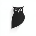 Black minimalist owl silhouette icon with large white eyes and shadow on white background Royalty Free Stock Photo