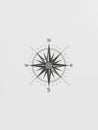 Simple black and white compass rose on light gray background - perfect for navigation apps and travel services Royalty Free Stock Photo