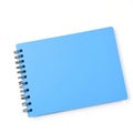 A blank, rectangular spiral notebook with a blue cover, isolated on a white background Royalty Free Stock Photo