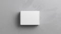 Simple Box on Textured Gray Surface, Minimalist Still Life, Square Composition. Royalty Free Stock Photo