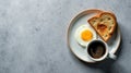 A simple breakfast of a fried egg, toasted bread, and a cup of coffee on a plate. Generative AI Royalty Free Stock Photo