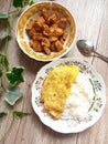 a simple breakfast with fried eggs and soy sauce tofu
