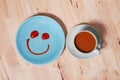 Simple breakfast with smile face on dish Royalty Free Stock Photo