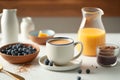 Simple breakfast table setting with cup of coffee with cream orange juice blueberries. Soft morning light. AI generated