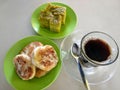 A Simple Breakfast With Traditional Cakes And Blac Coffee Royalty Free Stock Photo