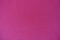 Simple bright deep pink textile from above