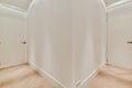 Simple bright doorway corridor with white walls Royalty Free Stock Photo