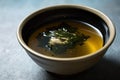 simple broth, with seaweed, bamboo shoots and sesame seeds