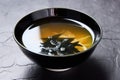 simple broth, with seaweed, bamboo shoots and sesame seeds