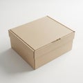 Simple brown cardboard box on a plain surface Royalty Free Stock Photo