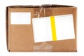 Simple brown carton package, post delivery parcel, box with white blank empty labels, address stickers, paper notes, nobody Royalty Free Stock Photo