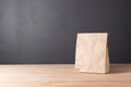 simple brown paper bag for lunch or food on table Royalty Free Stock Photo