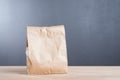 simple brown paper bag for lunch or food on table Royalty Free Stock Photo