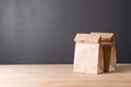 simple brown paper bag for lunch or food on table Royalty Free Stock Photo