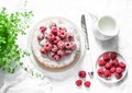 Simple butter cake with raspberry on light background, top view. Delicious summer dessert. Royalty Free Stock Photo