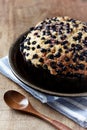 Simple Cake with Bilberries on wooden background. Royalty Free Stock Photo