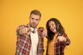 Simple casual clothes. Couple feeling comfortable. Country music concept. Country style. Woman and man wear checkered