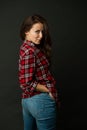 Simple casual clothes. Feeling comfortable. She prefers casual style. Country style. Woman checkered shirt. Attractive