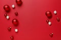 Simple Christmas ornaments decorations background. Simple, modern, classic red and white glass baubles balls horizontal border. Royalty Free Stock Photo