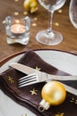 Christmas table place setting in vintage or rustic style. Royalty Free Stock Photo