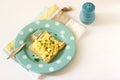 Simple classic breakfast of bread toast and scrambled eggs with parsley. Royalty Free Stock Photo