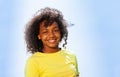 Simple clear happy portrait of curly black girl