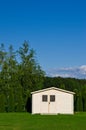 New garden house or shed in green lawn or grass Royalty Free Stock Photo