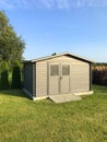 New garden house or shed in green lawn or grass Royalty Free Stock Photo