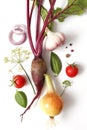 Simple composition of organic vegetables, top view. Onions, beets, garlic, basil, tomato, dill and spices. The concept of organic Royalty Free Stock Photo