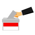 Simple concept, man hand using tuxedo give a paper vote at indonesia election