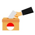 Simple concept, man hand using tuxedo give a paper vote at indonesia election