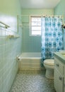 Simple dated 1950s bathroom.