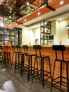 Bar interior with empty stools Royalty Free Stock Photo