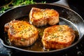 Simple and delicious pan fried pork chops in sizzling butter with thyme. Traditional American cuisine dish specialty Royalty Free Stock Photo