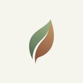 Simple design featuring two overlapping leaves, one green and the other brown, against a plain Royalty Free Stock Photo