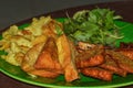 Simple Dish Of Raw Vegetable Side Dish Consisting Of Tempeh, Tofu, Scrambled Eggs, Basil Leaves, Served On A Plate