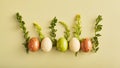 simple easter panoramic banner. minimalistic flower and eggs arrangement on a green background