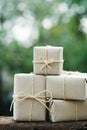 Simple eco friendly gift boxes package wrap with brown paper, green present concept, copy space Royalty Free Stock Photo