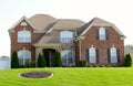 Simple Elegance Two-Story Brick and Cobblestone Home Royalty Free Stock Photo