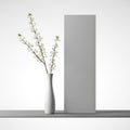 Simple elegance: white vase with flowers and minimalist gray block on white background Royalty Free Stock Photo