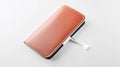 Minimalist Leather Wallet with USB Cable on Clean White Background Royalty Free Stock Photo