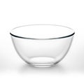 Clear glass mixing bowl on a white background Royalty Free Stock Photo