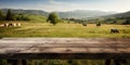 Simple empty wooden table against the background of a field with sheep, Generative AI